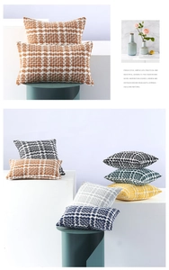 Close-up of woven two-tone throw pillow cover showing thick fabric texture and pattern