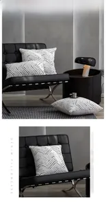 Detail of chenille pillowcases with black chevron pattern on a modern leather chair