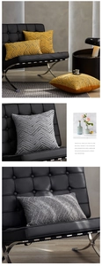 Detail of chenille cushion covers with geometric V-shape pattern on a designer chair