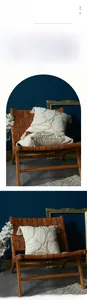 Detailed view of tufted leaf pattern and tassel edge on minimalist cream throw pillow