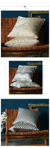 Detail of luxury geometric pillowcases in beige marble and silver grey patterns
