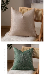 Detail of luxury geometric pillow cases with metallic texture and leaf embroidery