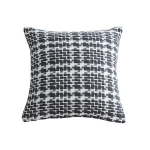 Modern square cushion cover featuring a black and white geometric woven texture on white background