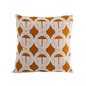 Burnt orange square pillow cover with white geometric repeat patterns for sofa decor