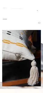 Detail of woven cotton cushion cover with invisible zipper and boho tassel fringe