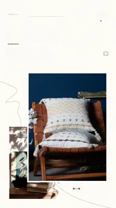 Detailed view of geometric embroidered cotton pillowcase with tassels and hidden zipper