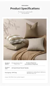 Detail of checkered and striped canvas pillow covers in warm earthy tones on a sofa