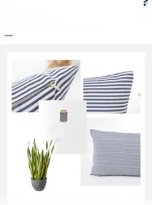 Detailed view of blue striped cotton pillowcase with invisible zipper and fine stitching