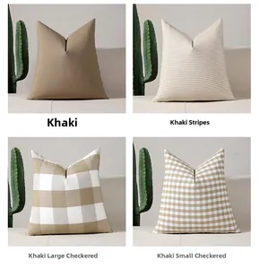Macro detail of khaki plaid and striped cushion covers in minimalist Nordic living room style
