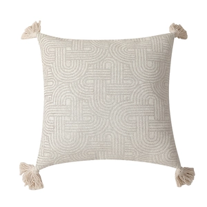 Minimalist geometric jacquard cushion with corner tassels in beige woven fabric