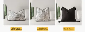Détail du coussin rétro français de luxe montrant le motif de palmier et les glands sur canapé