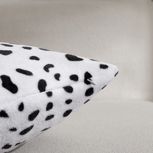 Nordic plush pillowcase with black and white spots and hidden zipper detail