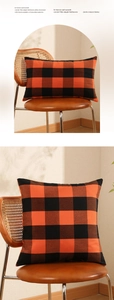 Detailed views of orange and black buffalo check Halloween cushion covers on a chair