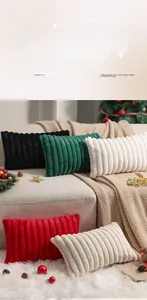 Detail showing plush striped cushions in various festive colors on a cozy sofa