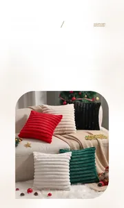 Macro detail of striped faux rabbit fur pillow covers in festive holiday colors