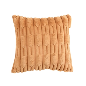 Faux rabbit fur pillow cover in warm camel with textured striped pattern on white background