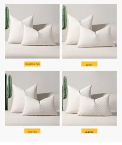 Macro detail of four textured cream chenille jacquard cushion covers with 3D embossed patterns