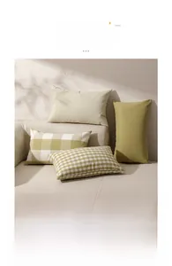 Set of 4 woven olive green and cream pillow covers with stripe and checkered patterns