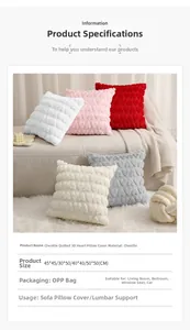 Detail view of snowy plush chenille cushion covers with 3D heart embroidery in five colors