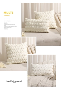 Detail of plush cream white heart embossed pillow covers for living room and bedroom decor