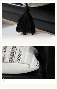 Détail de coussin chenille à rayures avec glands noirs et texture tissée