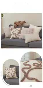 Close-up of soft lamb wool pillow covers with textured wave embroidery and fur finish