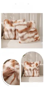 Detail showing plush faux fur texture and smooth hidden zipper of the cushion cover