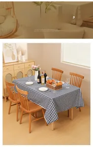 Detail of blue and white checkered tablecloth with water and oil resistant fabric texture