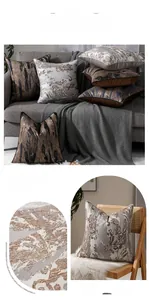 Détail de housses de coussin de luxe aux motifs vintage avec bordures à passepoil