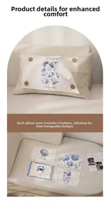 Detail of nautical pillow cover with wooden buttons and four interchangeable sea pattern panels