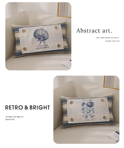 Detail of nautical lumbar pillow with shell print and decorative wooden buttons