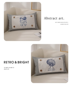 Macro view of ocean themed lumbar pillow with seashell print and vintage wooden buttons