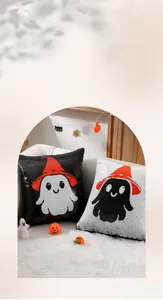 Macro detail of Halloween sequin pillows featuring cute ghosts and festive witch hats