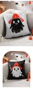 Detail of Halloween ghost sequin pillow with wizard hat and reversible two-tone flip effect