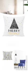 Detail of white Christmas pillow cover with golden stars and black tree print