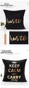 Detail of black velvet pillowcase with gold foil hustle and keep calm lettering