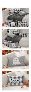 Dettaglio dei cuscini di Halloween con ricami a fantasma e 'Boo!' su un divano bianco chic