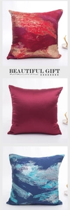 Detailed view of assorted decorative pillowcases featuring gold and silver foil art textures