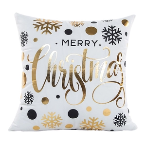 White Christmas pillow cover with golden Merry Christmas text and snowflake patterns