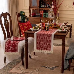 Nordic cotton linen Christmas table runner with reindeer pattern and cream tassels