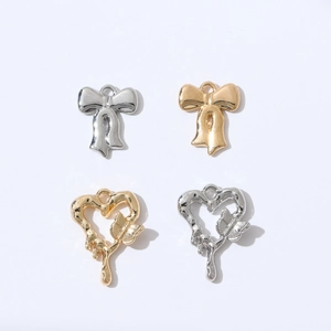 Set aus Gold- und Silberlegierung-Schleifen und Herzanhängern für DIY-Schmuck