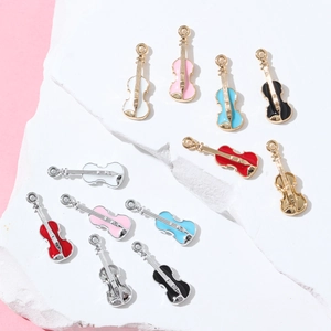 Fashionable mini violin pendant necklaces in various enamel colors on stone texture
