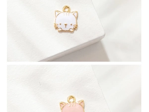 Macro detail of cute cartoon cat alloy charms with colorful oil drip finish for DIY jewelry