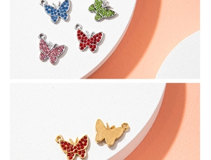 Macro shot of colorful rhinestone butterfly charms showing front and back detail