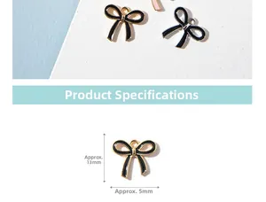 Detail showing dimensions of a 13mm black enamel bow charm with gold plating