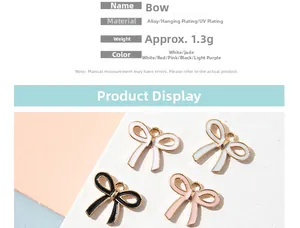 Detailed view of colorful bow-shaped alloy pendants with 1.3g weight and smooth plating