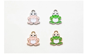 Detailed view of colorful cartoon frog charms for DIY jewelry making in enamel and alloy