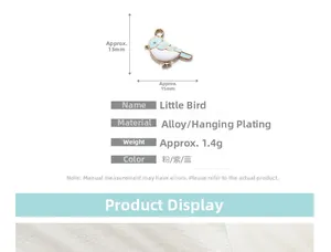 Detail view of bird pendant charms in light blue enamel with size 13mm by 15mm dimensions