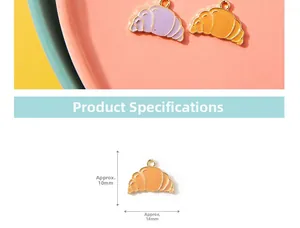 Macro detail of cartoon croissant alloy charm with dimensions 10mm by 14mm