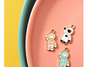 Cartoon astronaut alloy pendants in pink, white and blue for DIY jewelry making